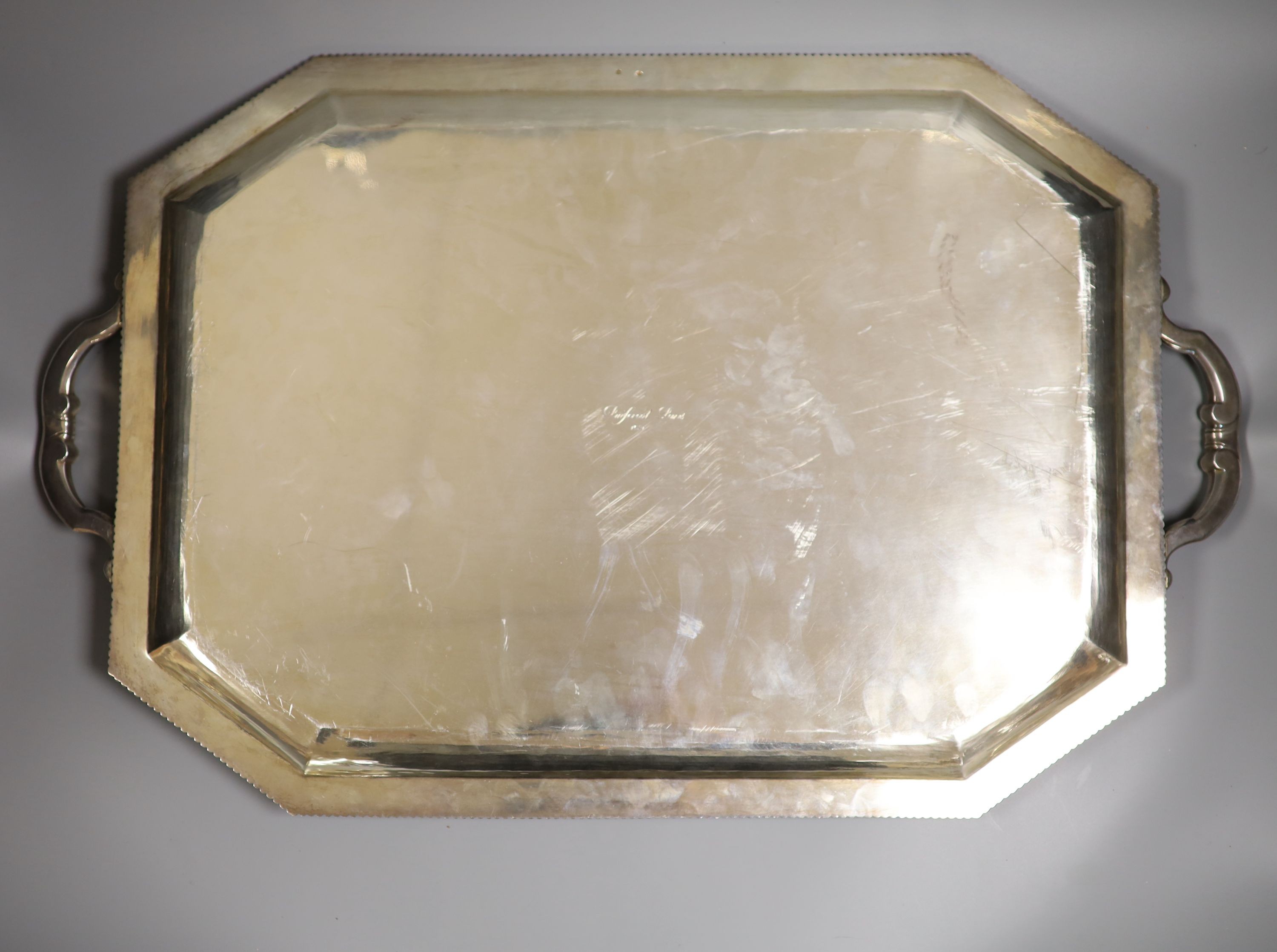 A 20th century French 950 standard white metal two handled tea tray by Emile Puiforcat, 64.5cm over handles, 132.5oz.